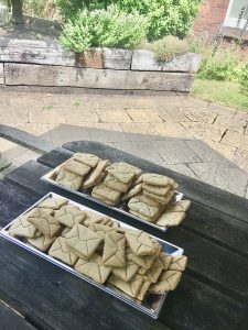 A picture of baked biscuits in the shape of letter biscuits